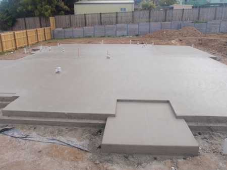 A concrete foundation for a new home
